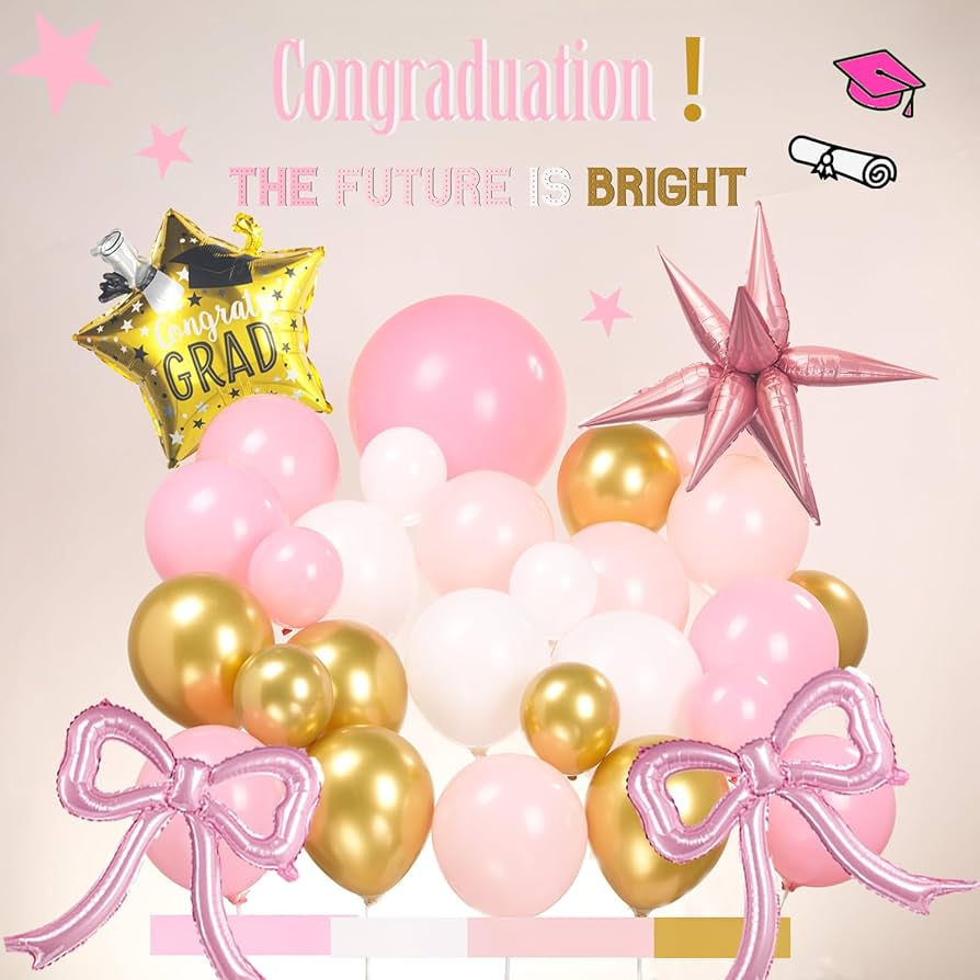 Pink and gold graduation balloon arch and party setup